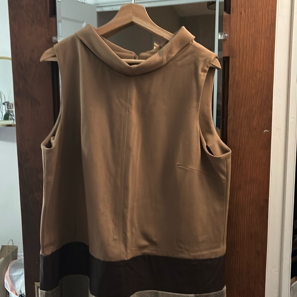 Light brown leather and plaid dress Sara campbell